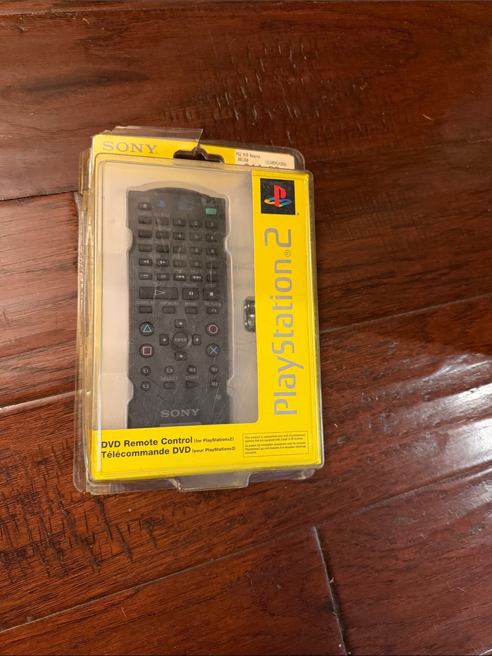 Sony Black PlayStation 2 DVD Remote in Yellow Retail Blister